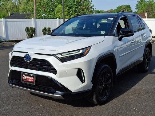 Wind Chill Pearl/Midnight Black Metallic 2024 Toyota RAV4 Hybrid SE