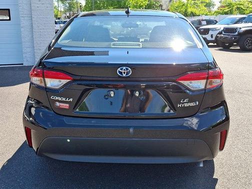 Midnight Black Metallic 2024 Toyota Corolla Hybrid LE