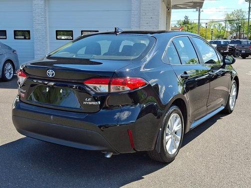Midnight Black Metallic 2024 Toyota Corolla Hybrid LE