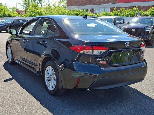 Midnight Black Metallic 2024 Toyota Corolla Hybrid LE