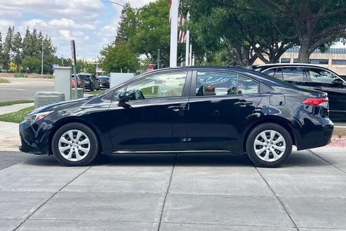 Midnight Black Metallic 2024 Toyota Corolla Hybrid LE