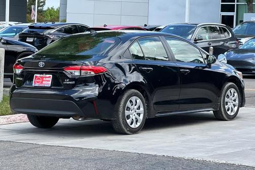 Midnight Black Metallic 2024 Toyota Corolla Hybrid LE