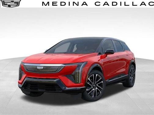 Orange 2026 Cadillac OPTIQ Premium Sport