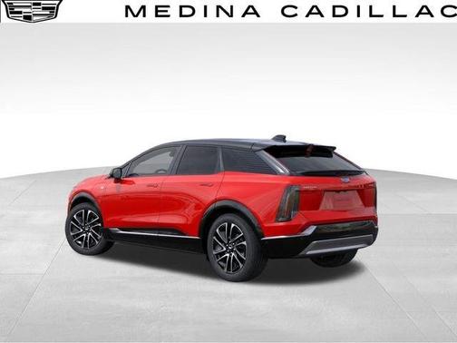 Orange 2026 Cadillac OPTIQ Premium Sport