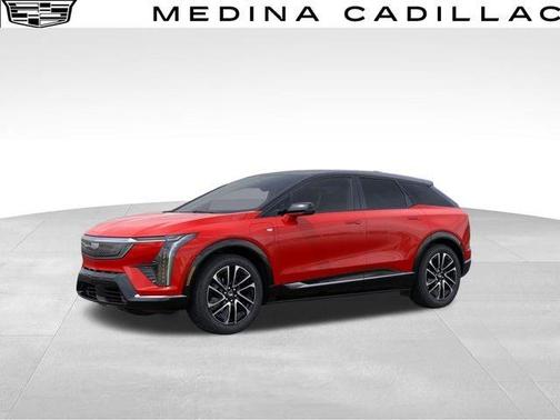 Orange 2026 Cadillac OPTIQ Premium Sport