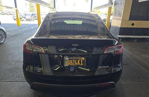 Black 2023 Tesla Model Y Performance