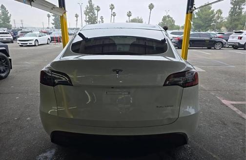 Pearl White Multi 2024 Tesla Model Y Long Range