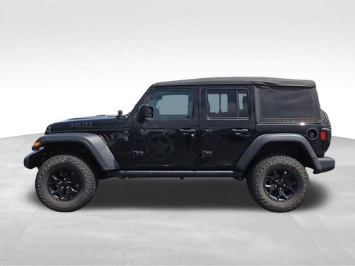 Black 2023 Jeep Wrangler Sport
