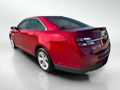 Red 2014 Ford Taurus SEL