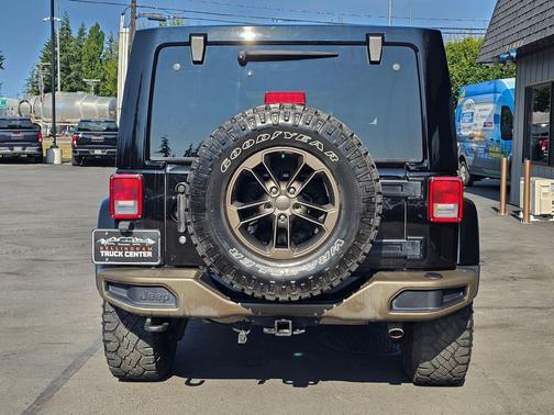 Black Clear Coat 2016 Jeep Wrangler Unlimited Sahara