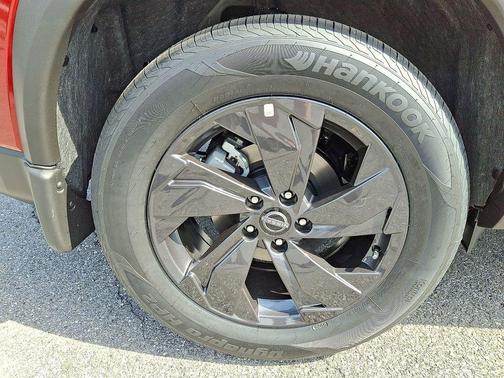 Scarlet Ember 2026 Nissan Rogue SV