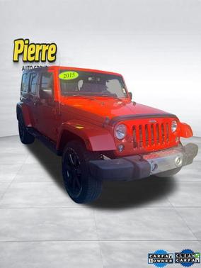 Sunset Orange 2015 Jeep Wrangler Unlimited Sahara