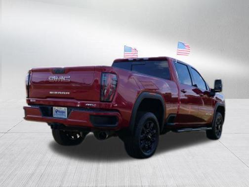 Volcanic Red Tintcoat 2024 GMC Sierra 2500 AT4