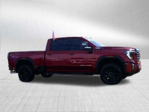 Volcanic Red Tintcoat 2024 GMC Sierra 2500 AT4