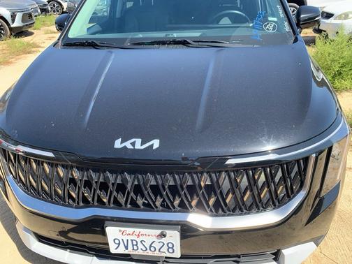 Aurora Black Pearl 2026 Kia Carnival Hybrid LXS