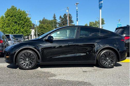 Solid Black 2024 Tesla Model Y Long Range Dual Motor All-Wheel Drive