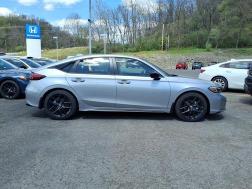 Solar Silver Metallic 2026 Honda Civic Sport