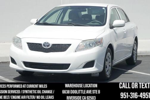 Super White 2010 Toyota Corolla LE