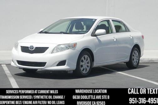 Super White 2010 Toyota Corolla LE