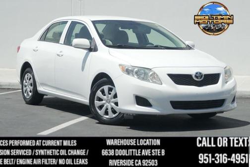 Super White 2010 Toyota Corolla LE