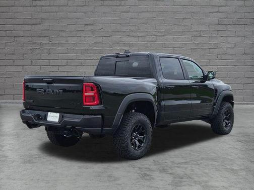 Diamond Black Crystal Pearlcoat 2026 RAM 1500 RHO Crew Cab 4x4 5'7' Box