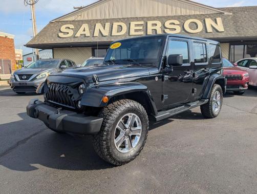 Black 2015 Jeep Wrangler Unlimited Sahara