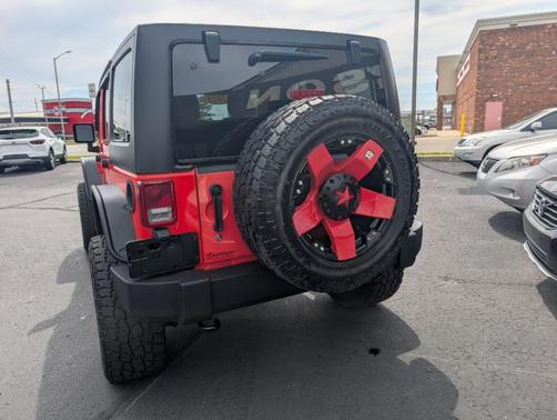 Red 2013 Jeep Wrangler Unlimited Sport