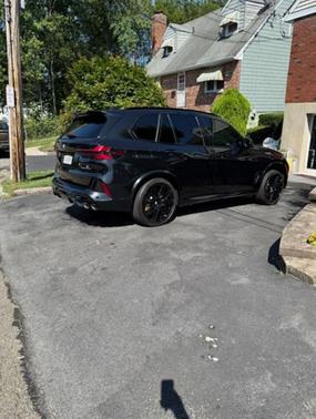 Black Sapphire Metallic 2024 BMW X5 M Competition