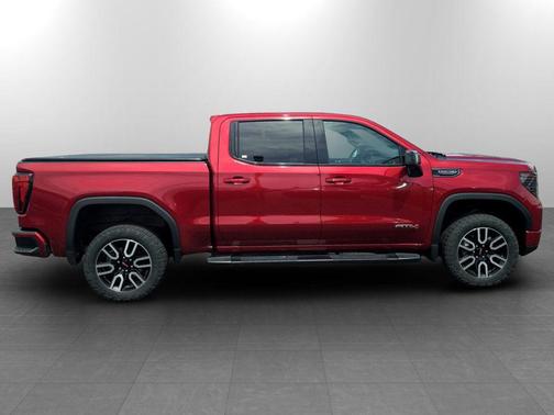 Volcanic Red Tintcoat 2023 GMC Sierra 1500 AT4