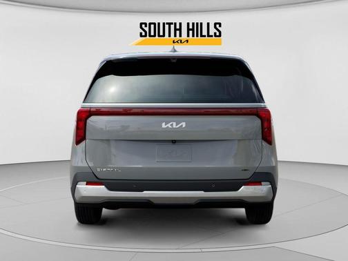 Ceramic White 2026 Kia Carnival Hybrid EX