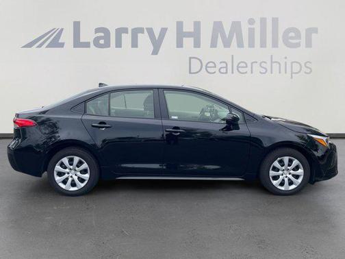Midnight Black Metallic 2025 Toyota Corolla Hybrid LE