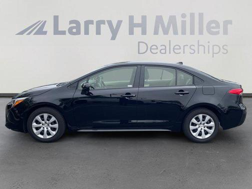 Midnight Black Metallic 2025 Toyota Corolla Hybrid LE