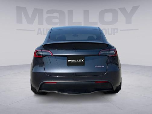 Solid Black 2025 Tesla Model Y Performance Dual Motor All-Wheel Drive
