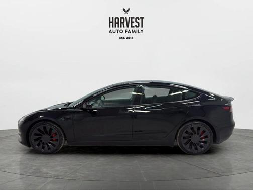 Solid Black 2023 Tesla Model 3 Performance