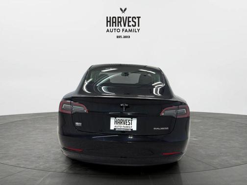Solid Black 2023 Tesla Model 3 Performance