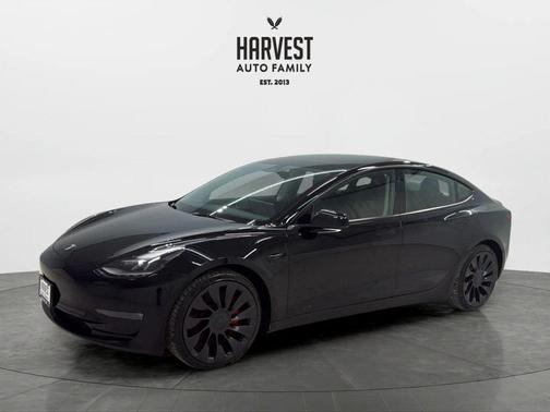 Solid Black 2023 Tesla Model 3 Performance