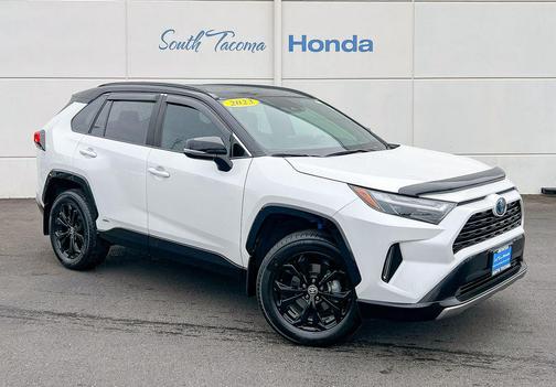 Wind Chill Pearl/Midnight Black Metallic 2023 Toyota RAV4 Hybrid SE