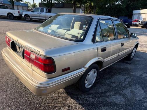 Almond Beige Pearl Metallic 1992 Toyota Corolla LE