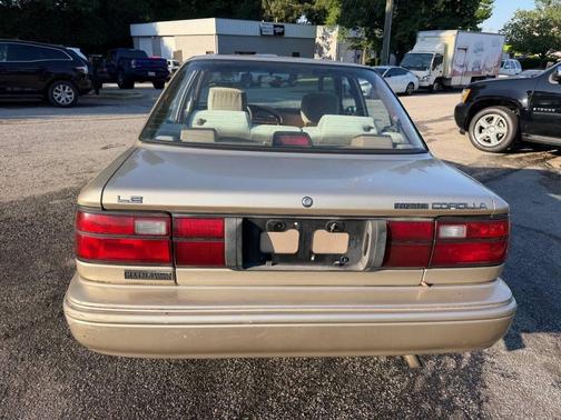 Almond Beige Pearl Metallic 1992 Toyota Corolla LE