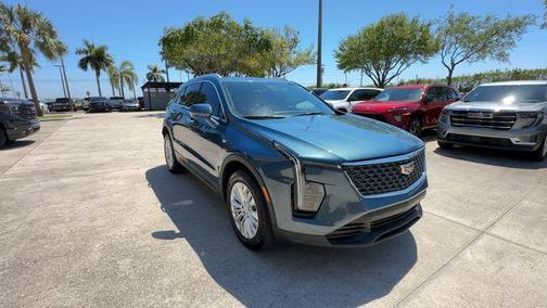 Deep Sea Metallic 2024 Cadillac XT4 Luxury