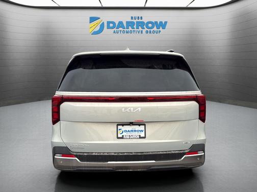 Ivory Silver 2026 Kia Carnival Hybrid SX