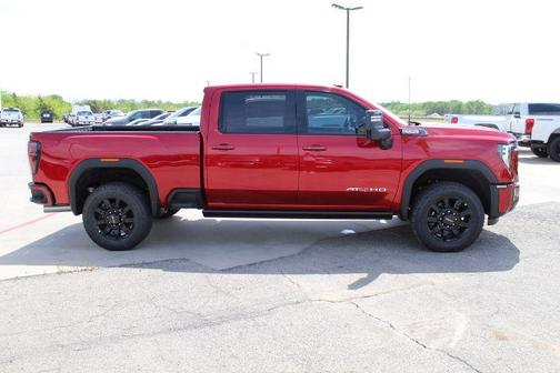 Volcanic Red Tintcoat 2026 GMC Sierra 2500 AT4