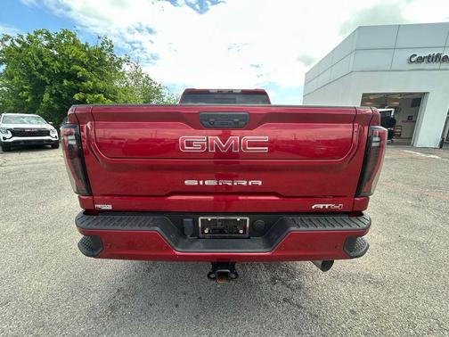 Volcanic Red Tintcoat 2024 GMC Sierra 2500 AT4