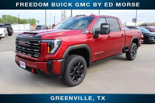 Volcanic Red Tintcoat 2026 GMC Sierra 2500 AT4