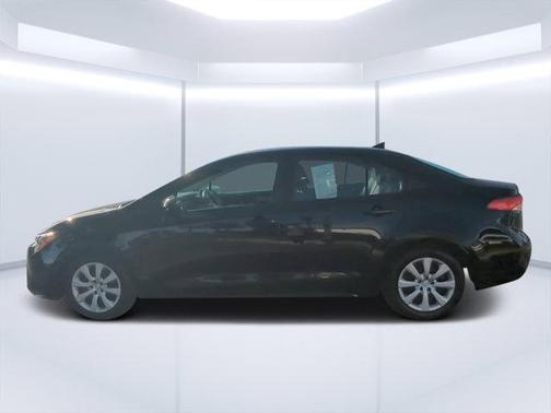 Midnight Black Metallic 2025 Toyota Corolla LE