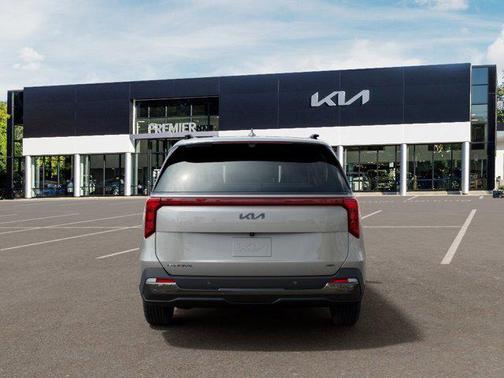 Ivory Silver 2026 Kia Carnival Hybrid SX