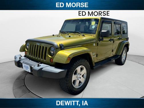 Rescue Green Metallic 2010 Jeep Wrangler Unlimited Sahara