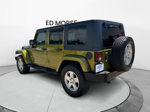 Rescue Green Metallic 2010 Jeep Wrangler Unlimited Sahara