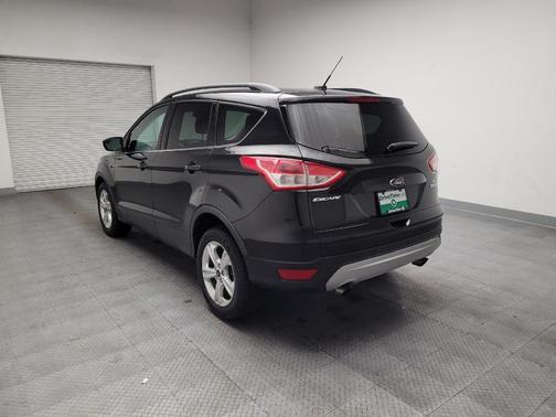 Ruby Red Metallic Tinted Clearcoat 2015 Ford Escape SE