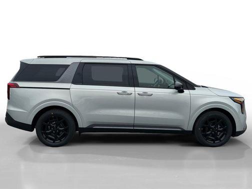 Ivory Silver 2026 Kia Carnival Hybrid SX